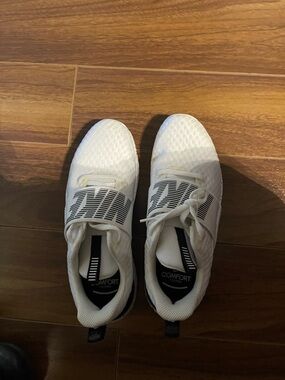 Nike Women’s White and Black Slip-On Sneakers